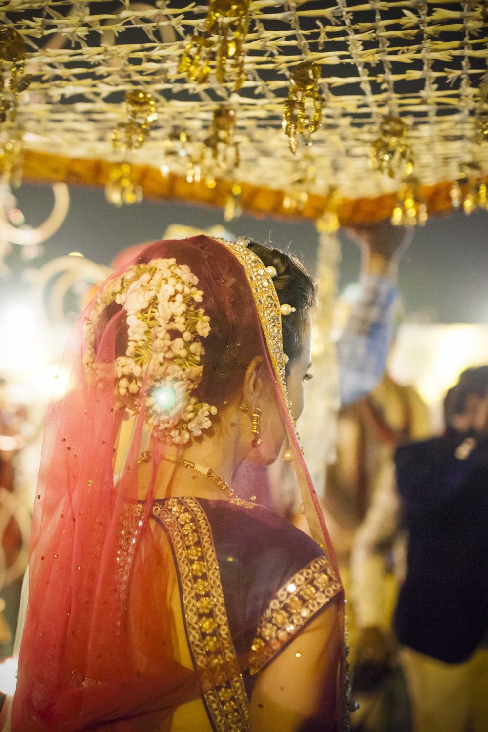 Photo of Bride Entering Under Phoolon ki Chadar with Kaleere
