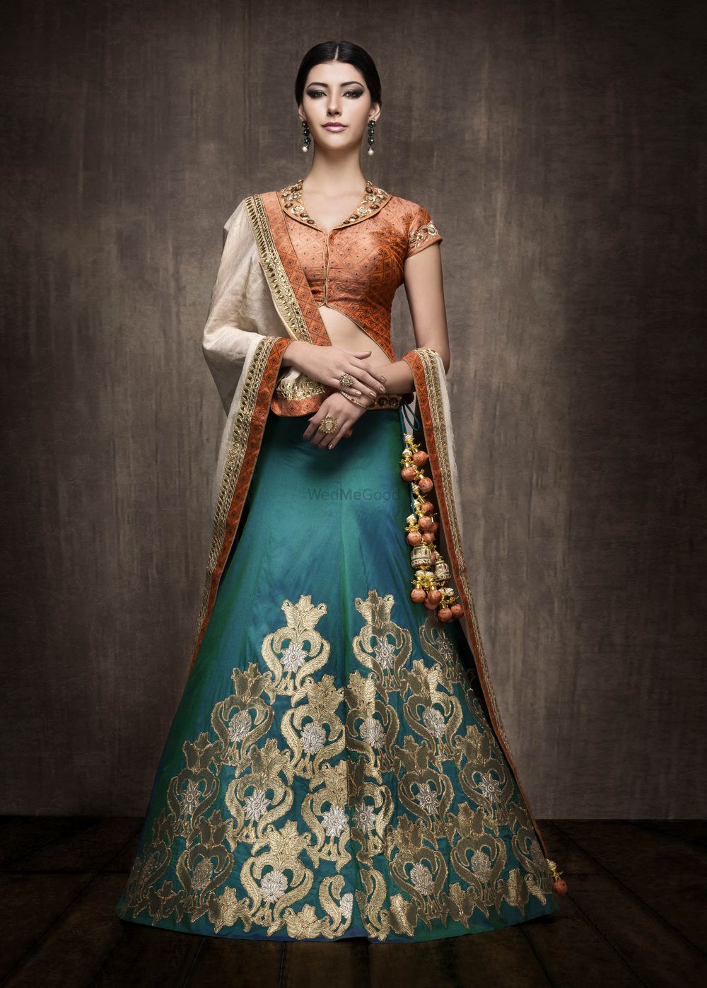 Photo of Blue lehenga with brown blouse and dupatta
