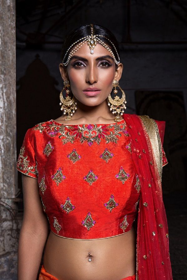 Photo of Red Blouse with Statement Earrings and Mathapatti