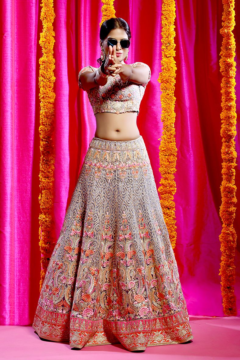 Photo of Light grey and red lehenga with bead work and sequins
