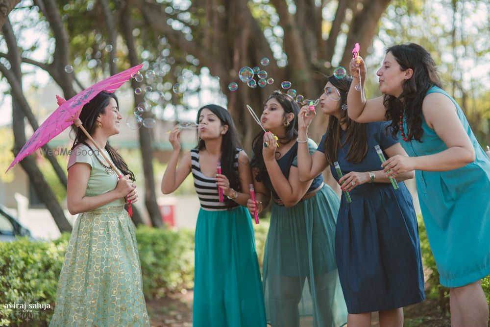 Photo of Bachelorette photo with bridesmaids blowing bubbles