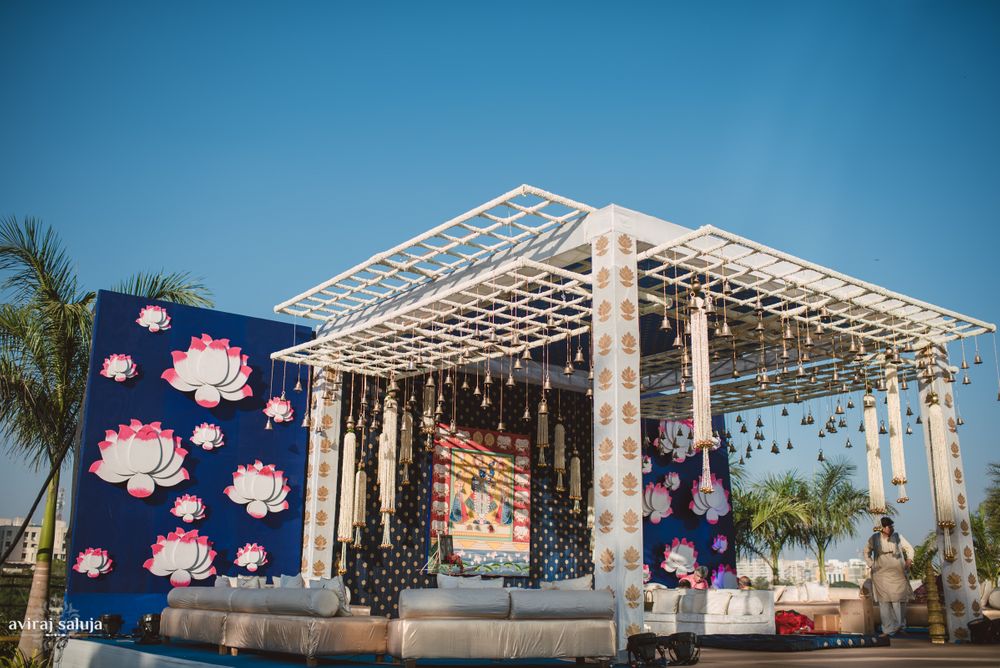 Photo of Modern mandap with prints and lotus cutouts
