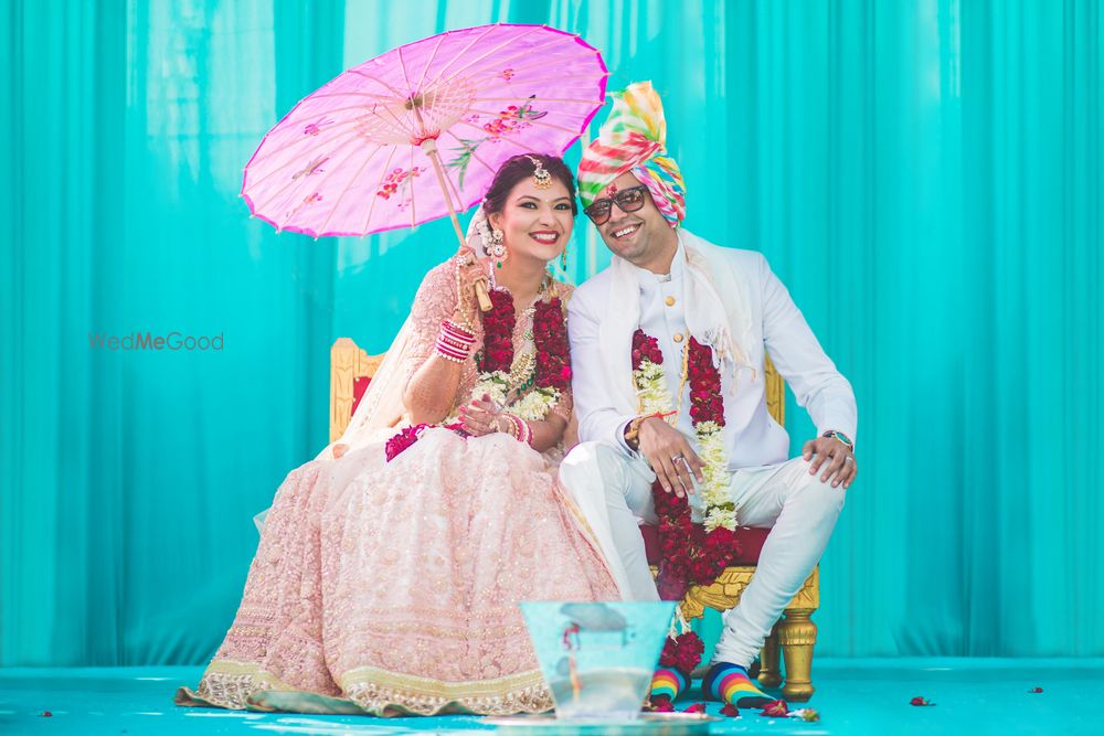 Photo of Couple Portrait with Paper Umbrella