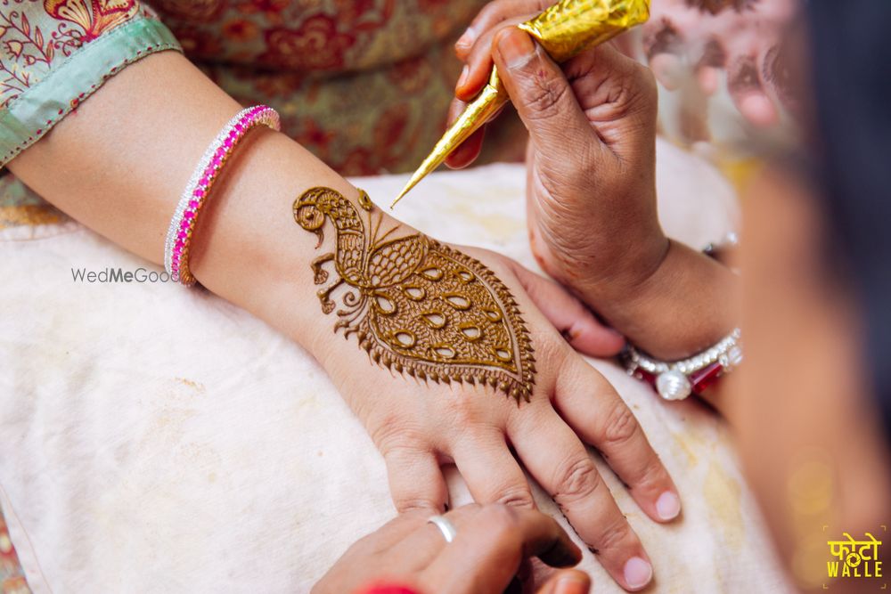 Photo of Peacock motif mehendi design