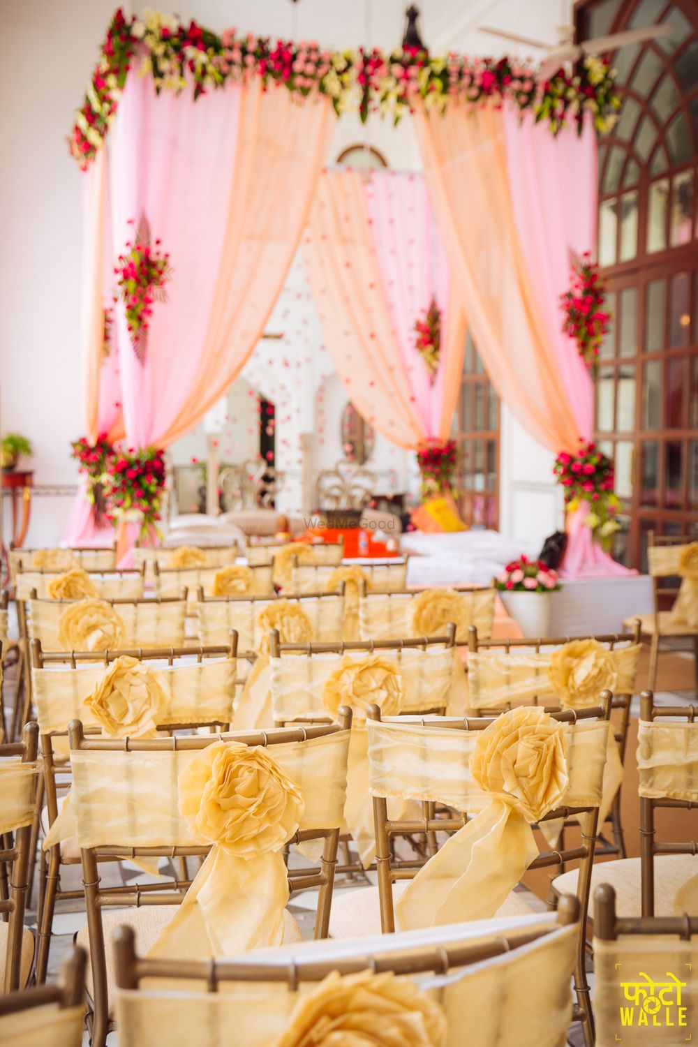 Photo of Light pink and yellow mandap and seating