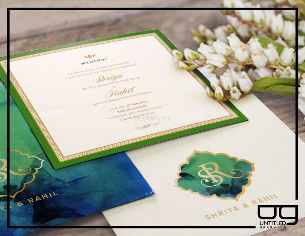 Photo of green and gold mehendi invite
