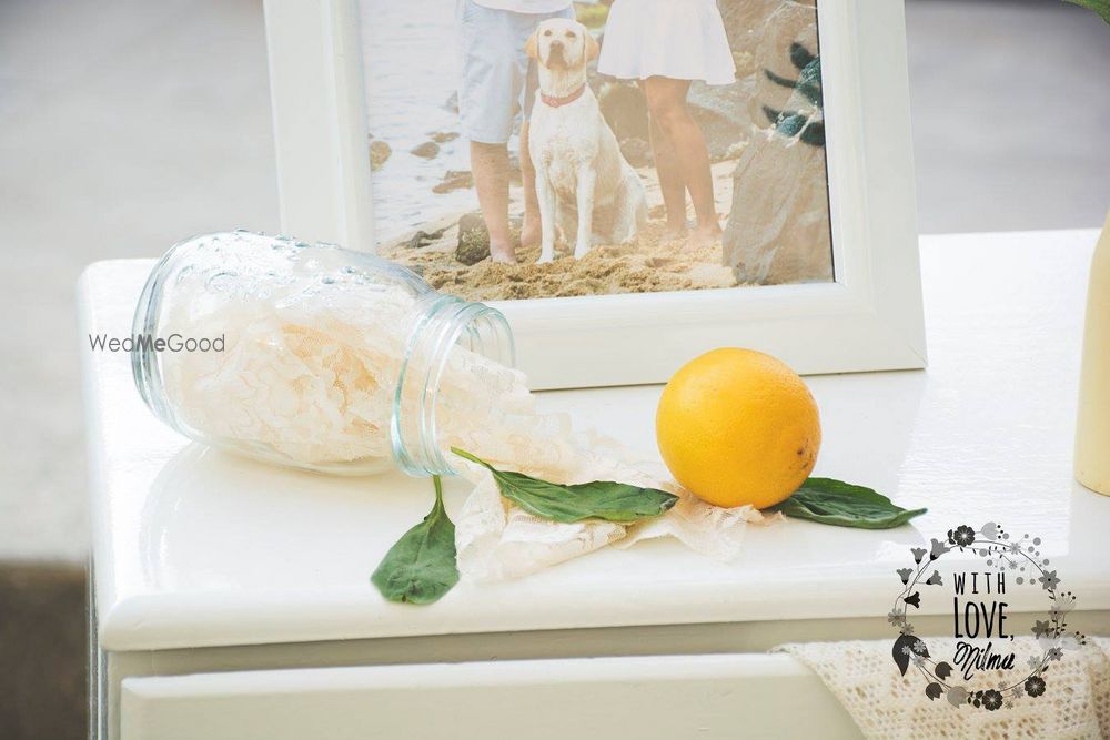 Photo of oranges inside mason jars