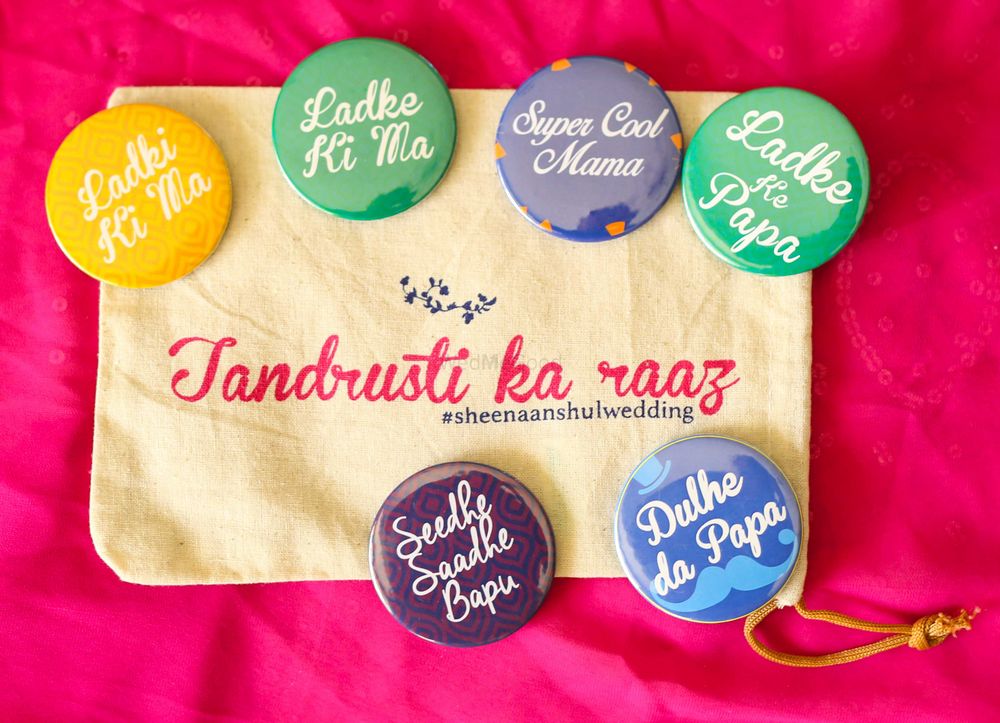 Photo of Colourful badges for bride's and groom's party