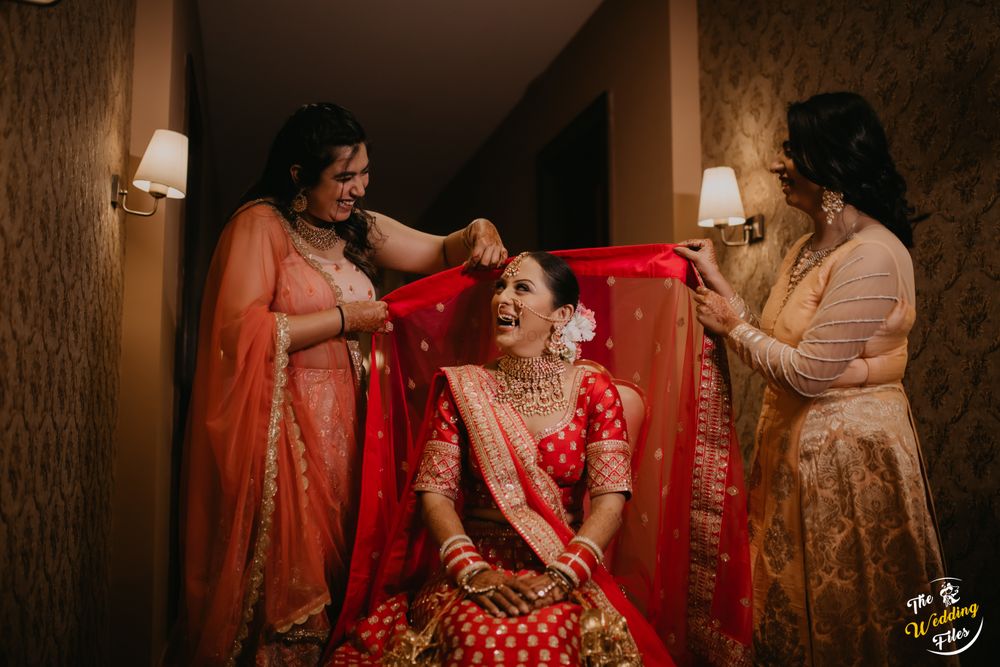 Photo of Bride getting ready with bridesmaids.