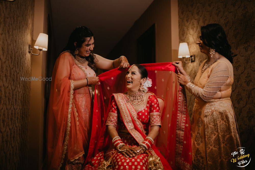 Photo of Bride getting ready with bridesmaids.