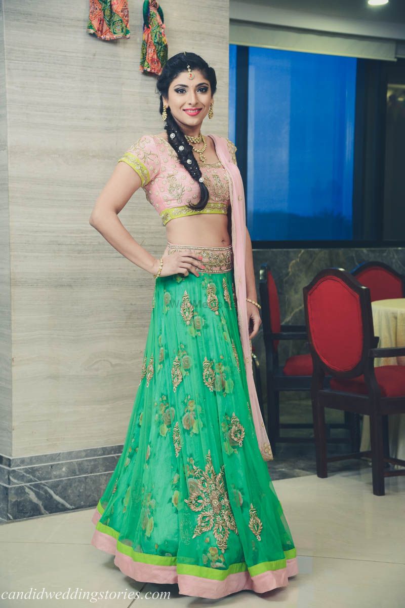 Photo of Light green floral print lehenga with blush pink blouse
