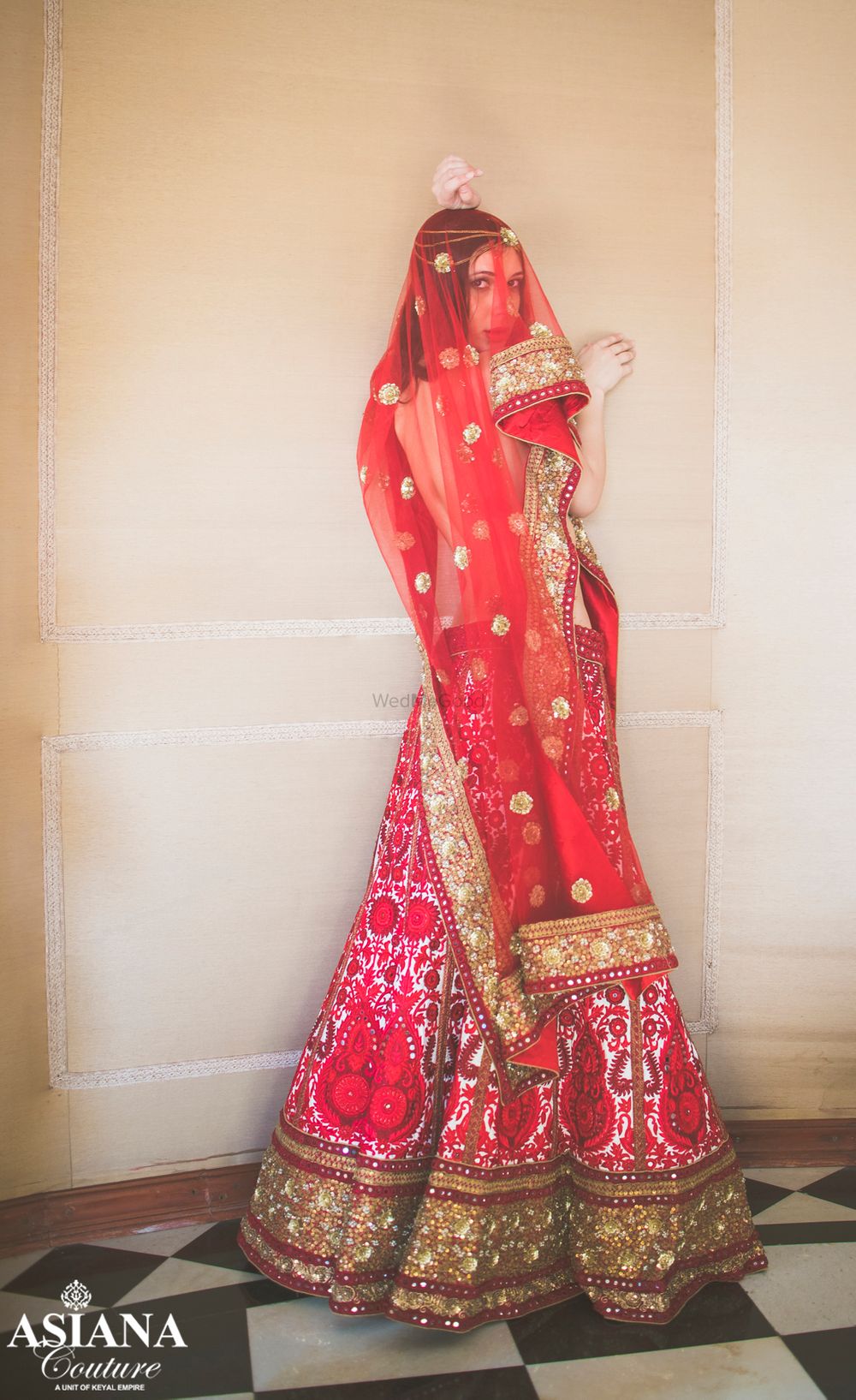 Photo of white and red bridal lehenga
