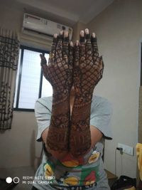 review-image-0-Mansi Mehendi Art