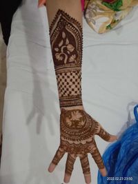 review-image-0-Mehndi by Priti