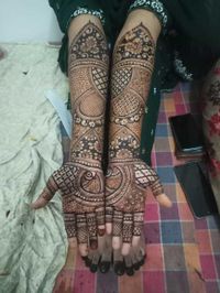 review-image-0-Fariha Mehndi 