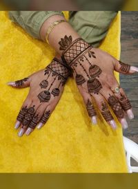 review-image-0-Rahul Mehandi Art