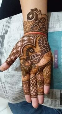 review-image-0-Damodar Mehandi Art