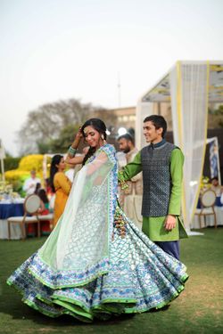 Photo of Beautiful green and blue mehendi lehenga