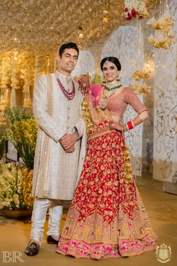 Matching Dress Couple Indian Bride And Groom Latest Gown For Engagement Groom In Black Tuxedo By Matching Dress Couple Indian Bride And Groom Latest Gown For Engagement Groom In Black Tuxedo By