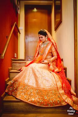 orange and pink bridal lehenga