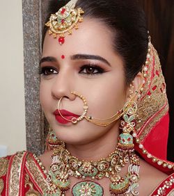 Dipika S North Indian Wedding Kareizma Makeup Hair Pictures