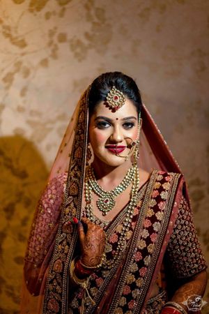 bridal lehenga maroon and golden