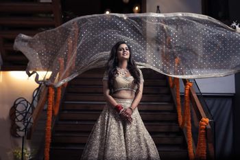 Photo of pretty bride and dupatta shot on her engagement