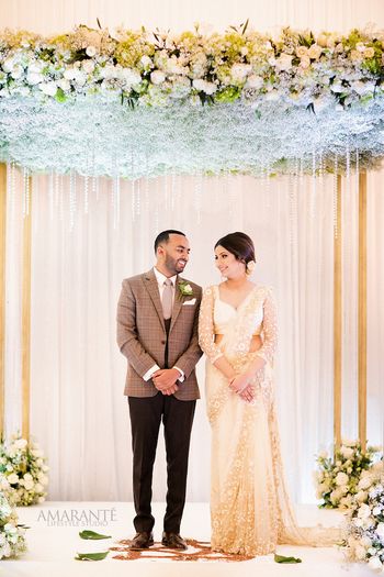 Photo of Stage decor idea with floral canopy