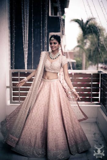 Soft pink elegant bridal lehenga by Sabyasachi