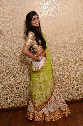 Photo of white and green with gold embroidery