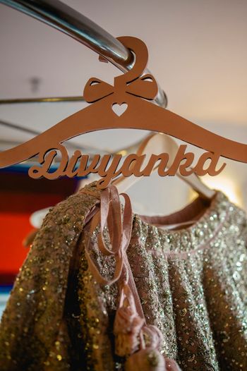 Photo of Personalised bridal hanger for lehenga.