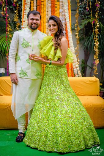 Photo of Unique mehendi lehenga with ruffled blouse
