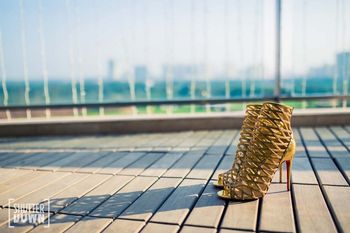 Photo of Gold gladiator heels for bride