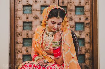Photo of Pretty bride looking down shot