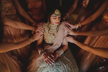 Photo of Unique bridal portrait idea with bridesmaids
