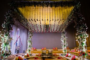 Photo of simple mandap with floral strings