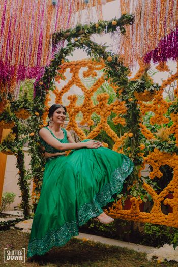 Photo of Bride in pretty green outfit for the mehendi