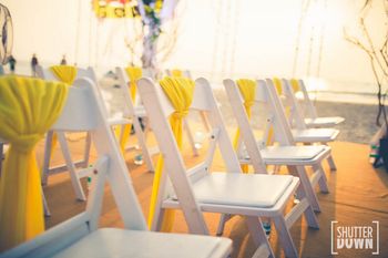 Photo of Yellow and white chairs