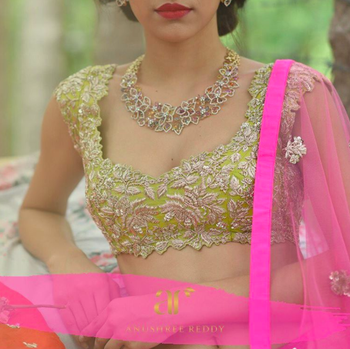 Photo of Mehendi lehenga in light green and pink