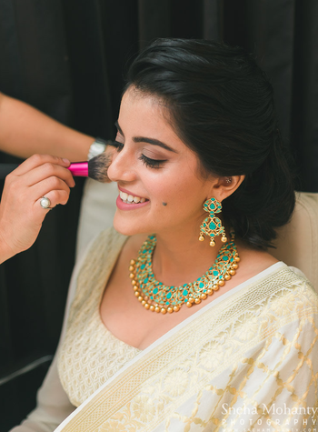 Pretty imitation jewellery with gold and turquoise 