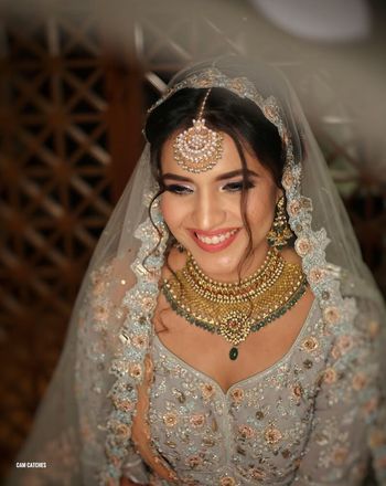 Photo of Offbeat bride in grey lehenga