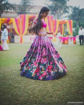 Photo of Bright pink and grey floral print lehenga for mehendi