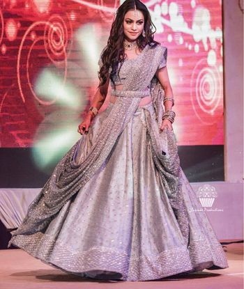 Photo of Silver lehenga for sangeet with waist belt