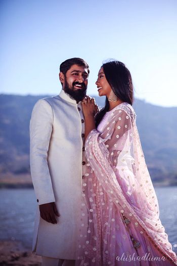 Photo of Romantic couple portrait in colour coordinate outfits