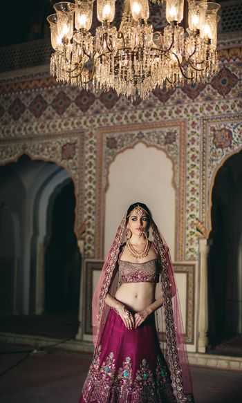 Photo of Simple wine bridal lehenga with dull gold work