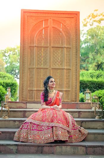 Coral Pink and Orange Bridal Lehenga with Zardozi Work