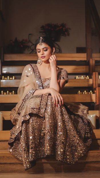Photo of Brown mirror work lehenga for sangeet