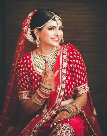 Cool bridal portrait with bride in red