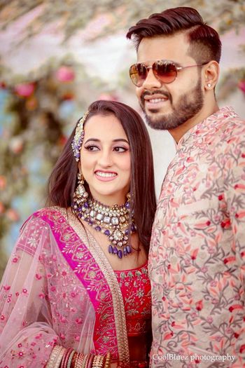 Photo of Bride in unique colored jewellery