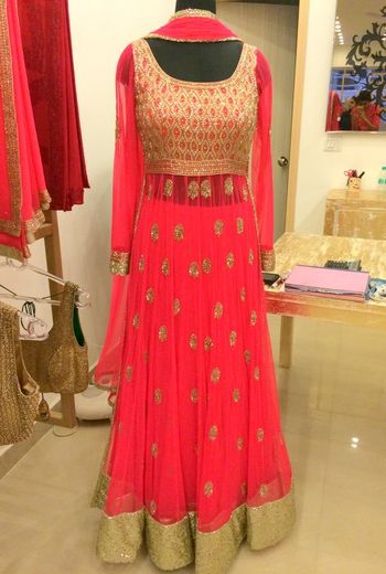 layered anarkali lehenga in raspberry pink
